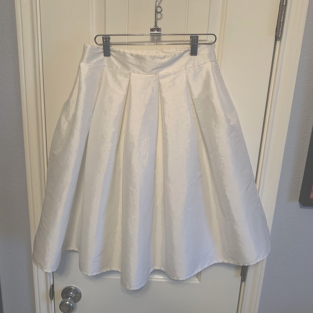 White ruffled skirt